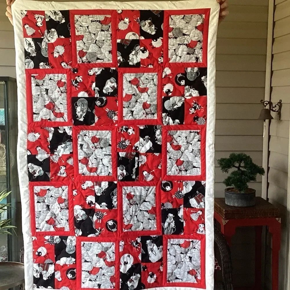 NWT. Black White and Red Sheep Lap Quilt Hand Crafted